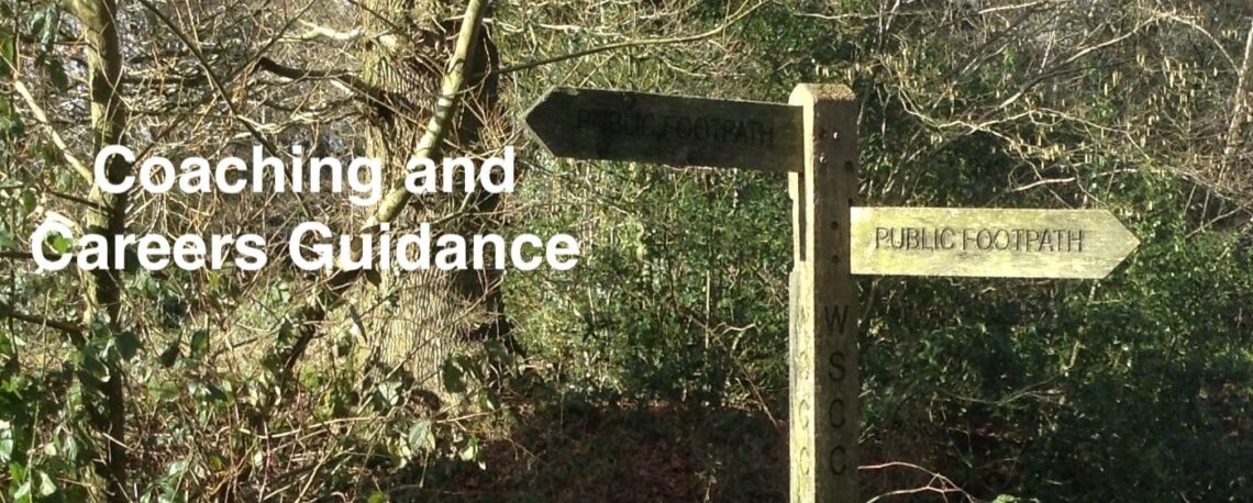 Signpost with writing