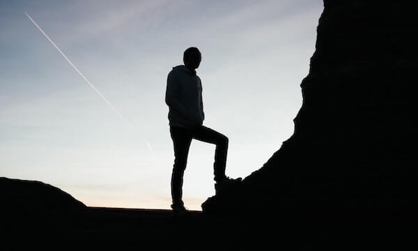 Man climbing rock
